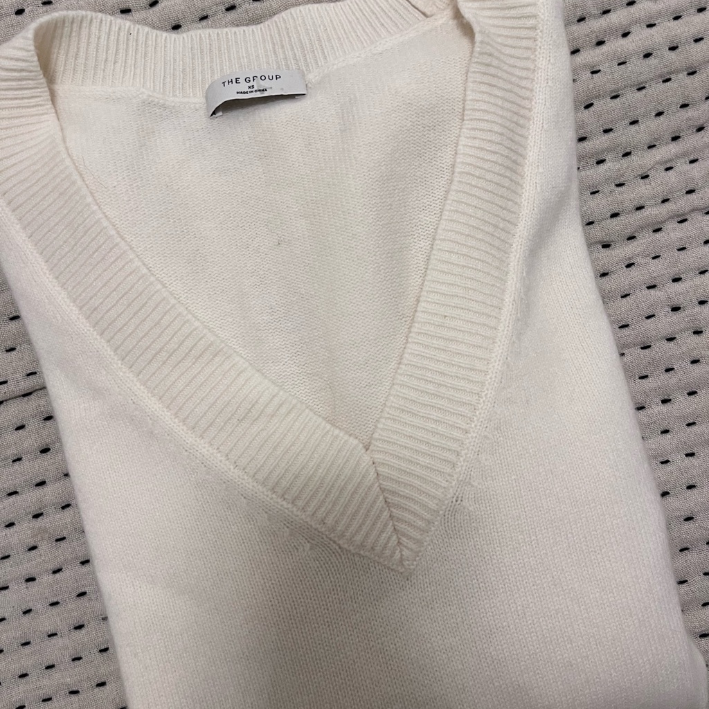 White V-Neck Sweater By The Group Babaton